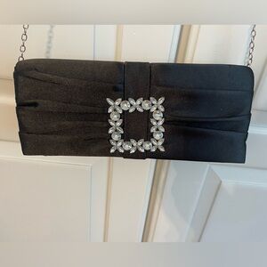 Black evening bag - includes chain link .
